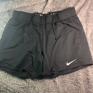 Black NIKE running shorts